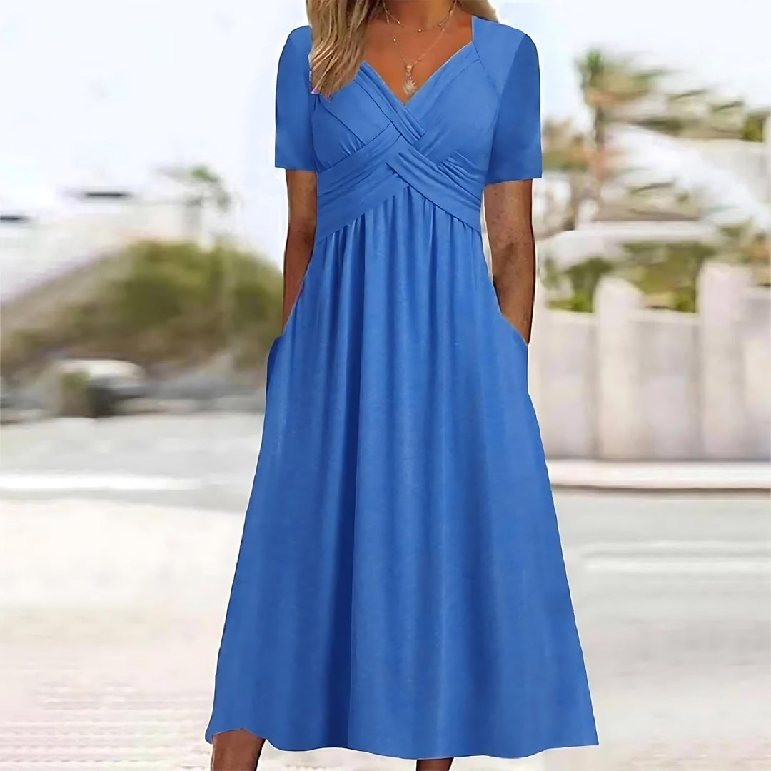 Women's elegant A-line midi dress, a flattering and versatile classic, suitable for both formal and casual summer wear.