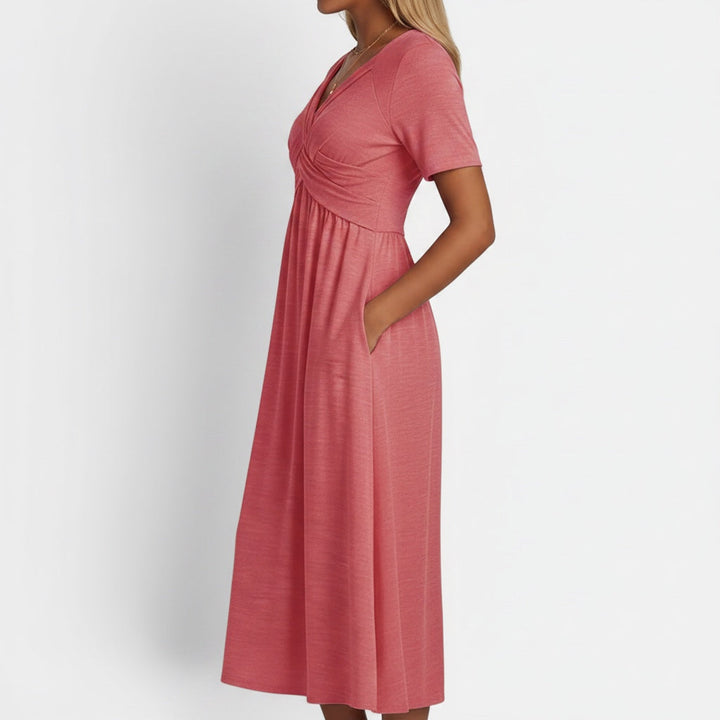 Chic A-line women's midi dress with short sleeves & pockets. Perfect elegant, versatile choice for everyday wear.