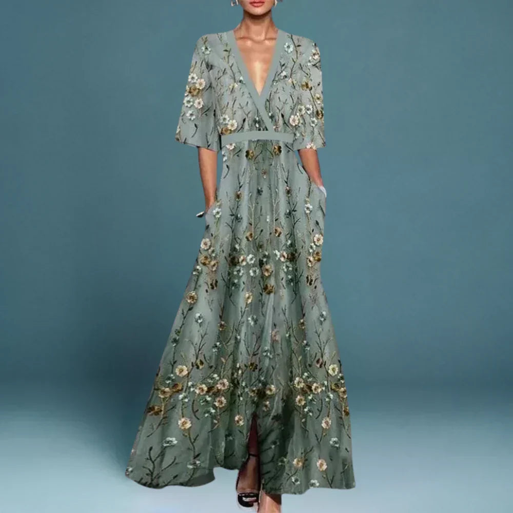 Elegant women's Adrienne floral maxi dress. Perfect for summer occasion wear, offering a flowy, feminine style.