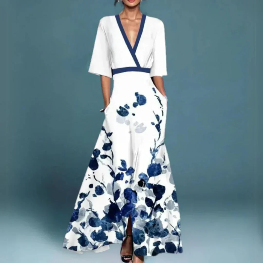 Adrienne women's maxi dress with a beautiful floral print. Ideal as a comfortable flowy summer day or occasion dress.