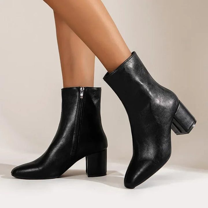 Refined women's ankle boots. Elegant, versatile design with a comfortable block heel & pointed toe.