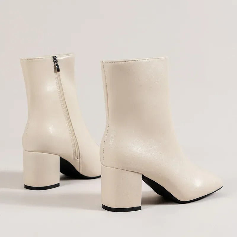 Versatile women's ankle boots for everyday wear. Elegant pointed toe, comfortable block heel style.