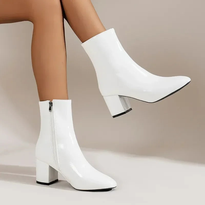 Women's ankle boots. Elegant block heel & pointed toe design offers comfort & versatile fashion.