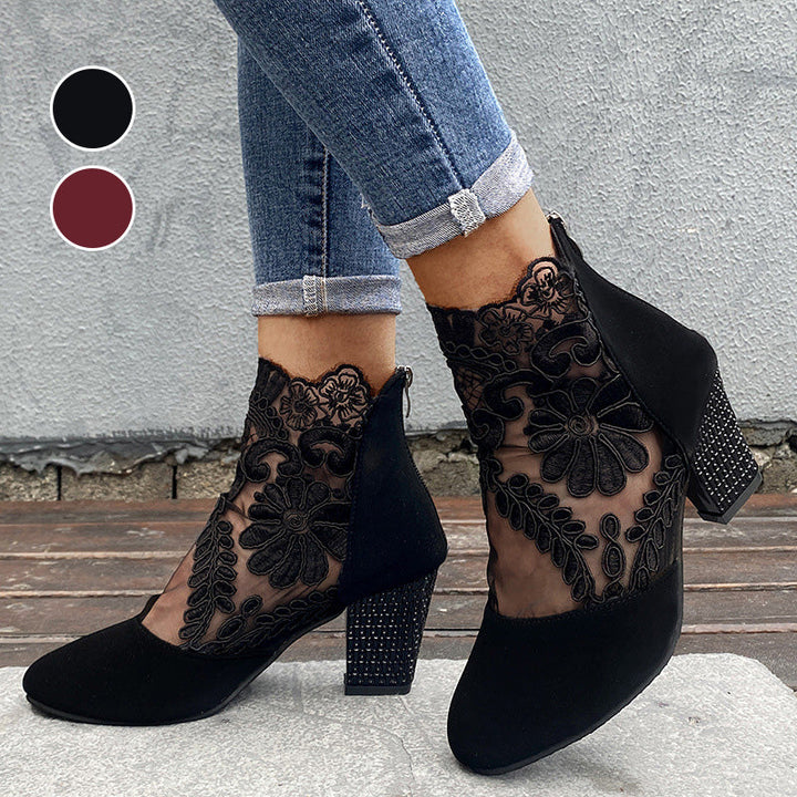 Elegant women's ankle boots with intricate lace embroidery & sturdy block heel. Perfect for sophisticated style.