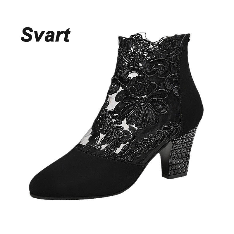 Elegant women's ankle boots for sophisticated style, featuring intricate lace embroidery and a sturdy block heel.