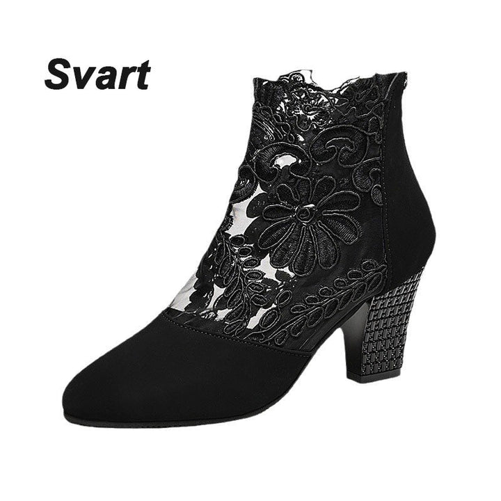 Elegant women's ankle boots for sophisticated style, featuring intricate lace embroidery and a sturdy block heel.