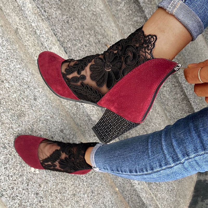 Front view: elegant women's block heel ankle boots with intricate lace embroidery, a must-have for fashion.