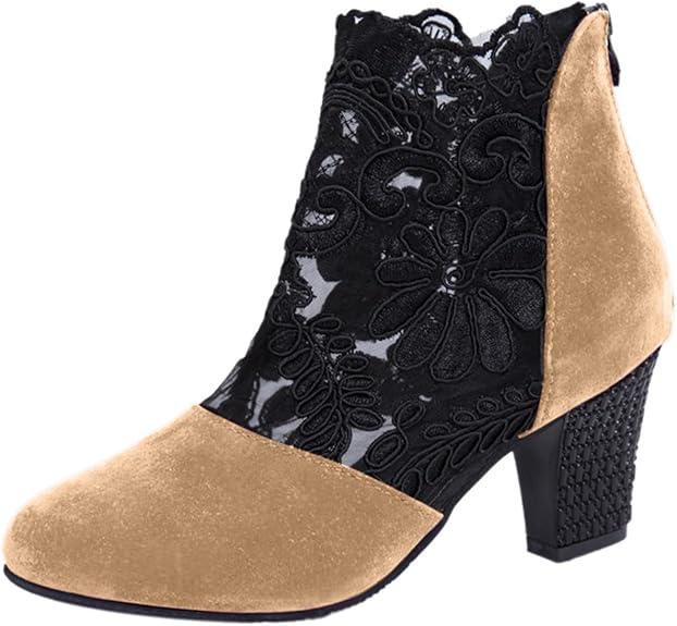 Close-up of the beautiful lace embroidery on women's black ankle boots, highlighting the elegant design.