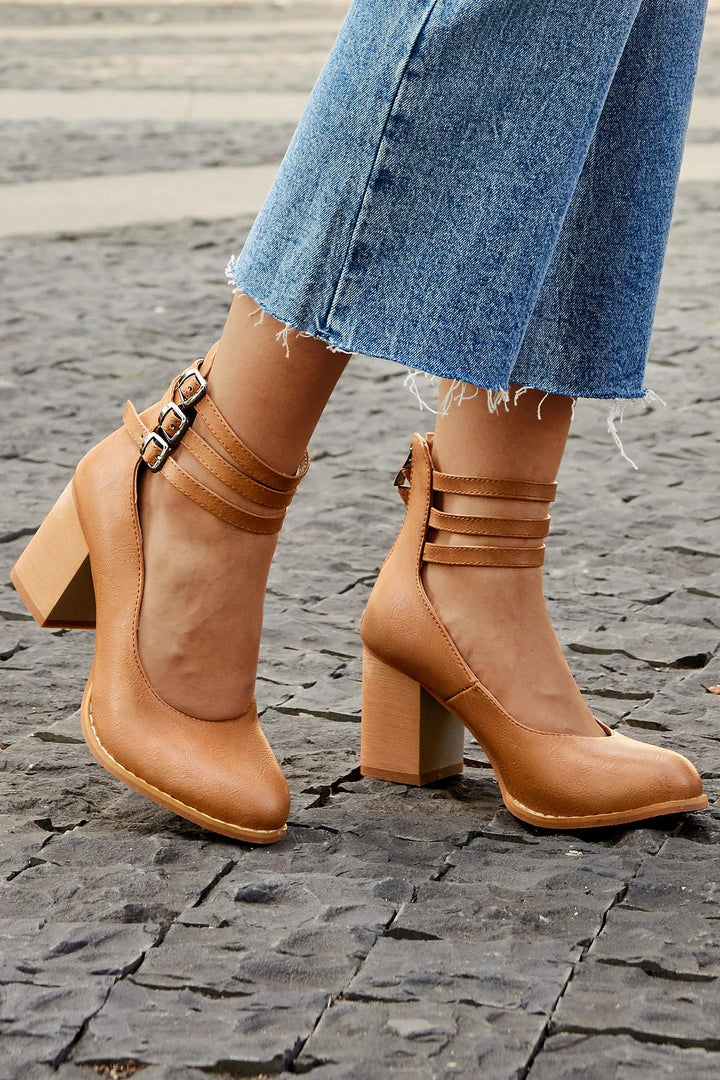 Elegant women's ankle strap block heels, comfortable & stylish closed toe design.
