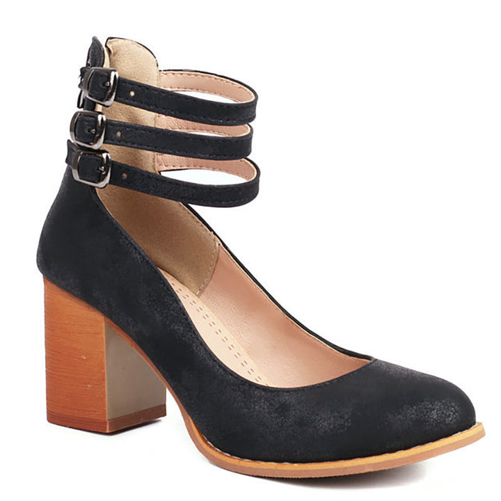 Modern party heels: vibrant red block heels with a secure ankle strap & chic closed toe design.