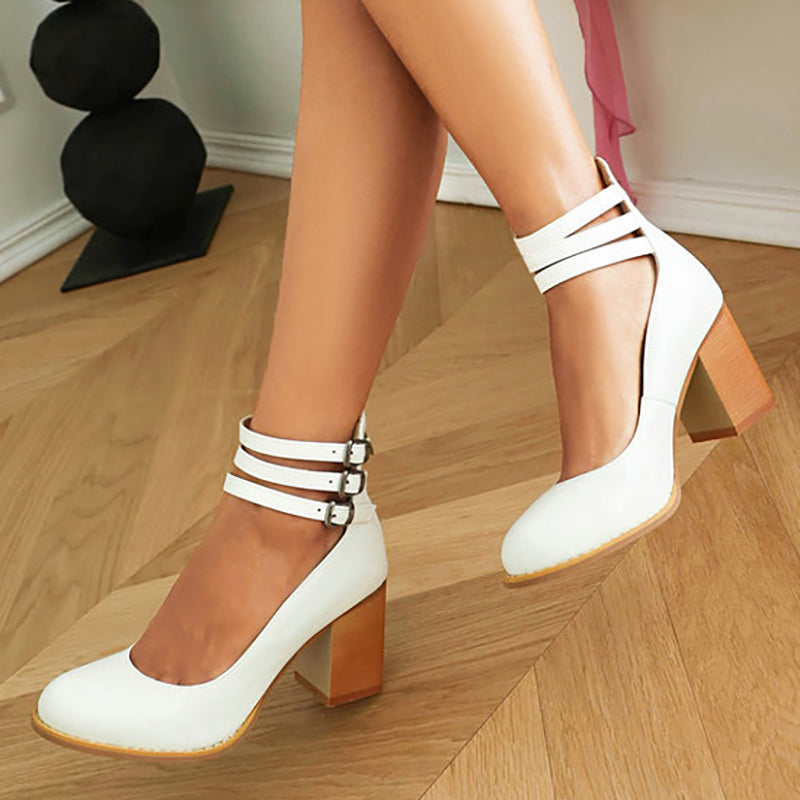 Classic black women's block heels, ankle strap & closed toe for elegant comfort and style.