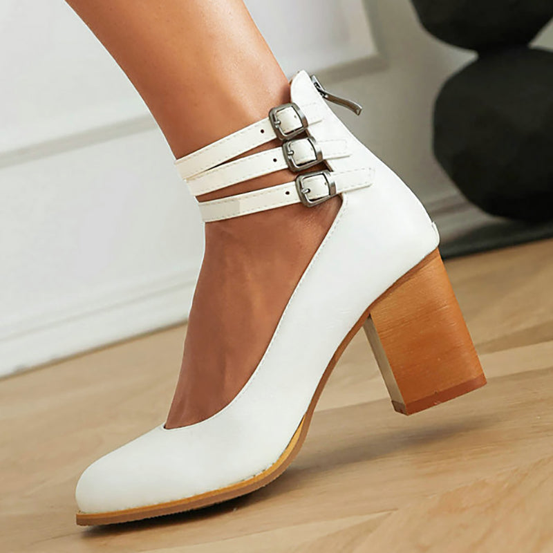Comfortable brown block heels, elegant ankle strap & closed toe design, versatile dress shoes.