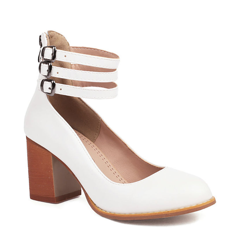 Chic white closed toe block heels, women's elegant footwear with a comfortable ankle strap.