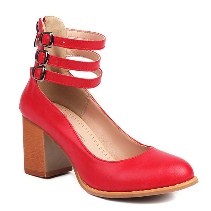 Versatile black ankle strap block heels, stylish & comfortable women's footwear with a closed toe.