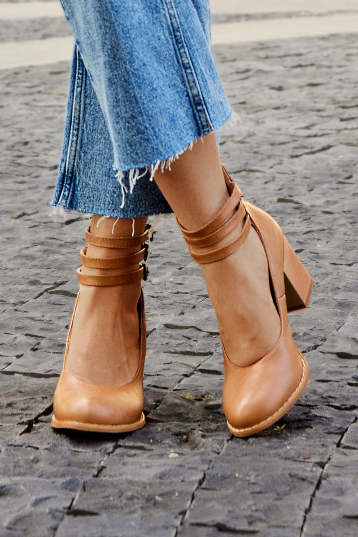 Striking red ankle strap block heels, ideal comfortable party shoes for women.