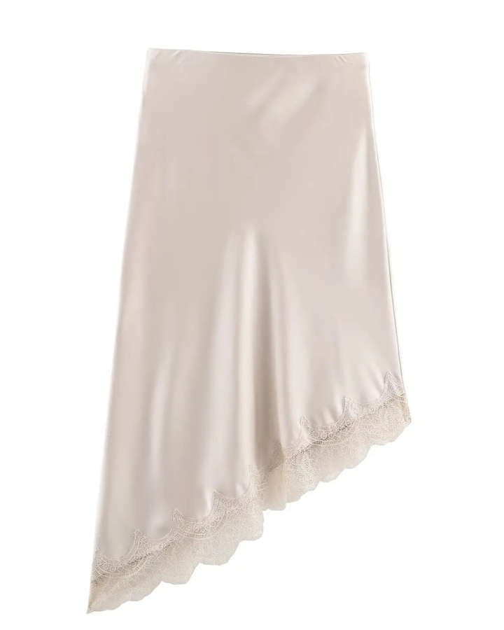 Modern women's asymmetric skirt in beige, a versatile and sophisticated piece for party or office wear.