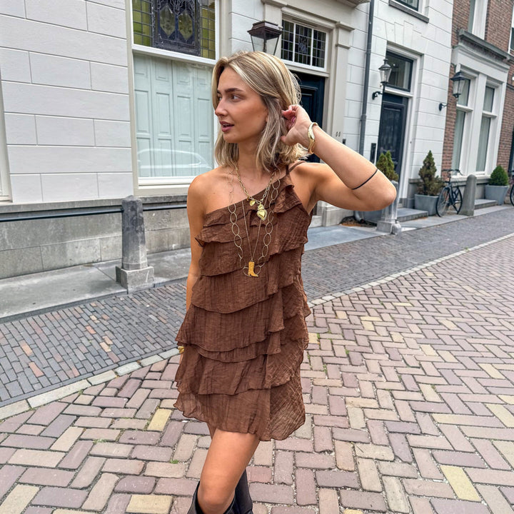 Elegant women's summer mini dress, one-shoulder asymmetric, ideal for casual parties.