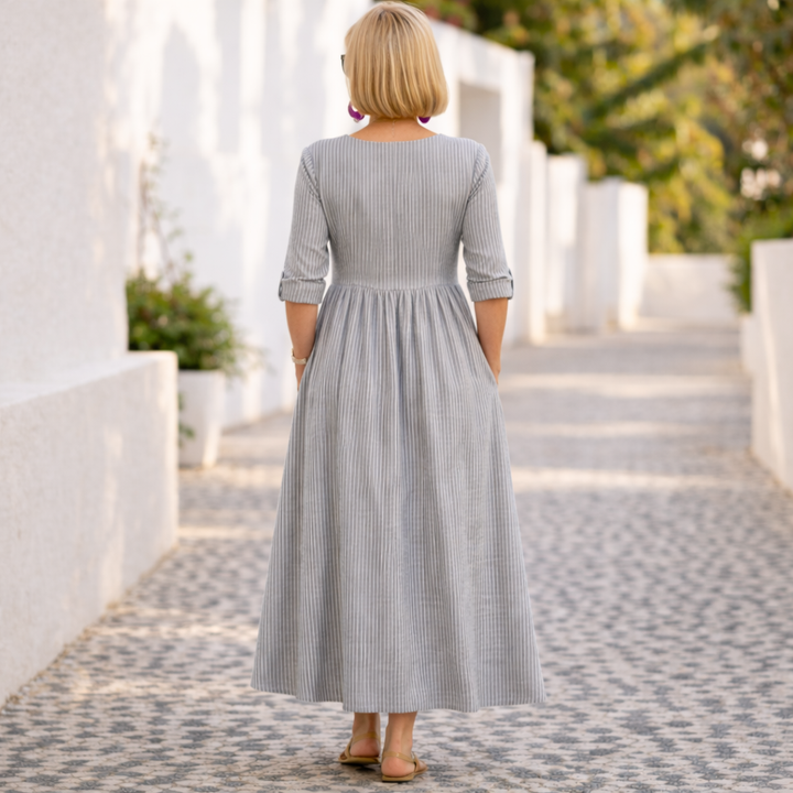 Stylish women's asymmetrical midi dress, an elegant and versatile fashion choice.