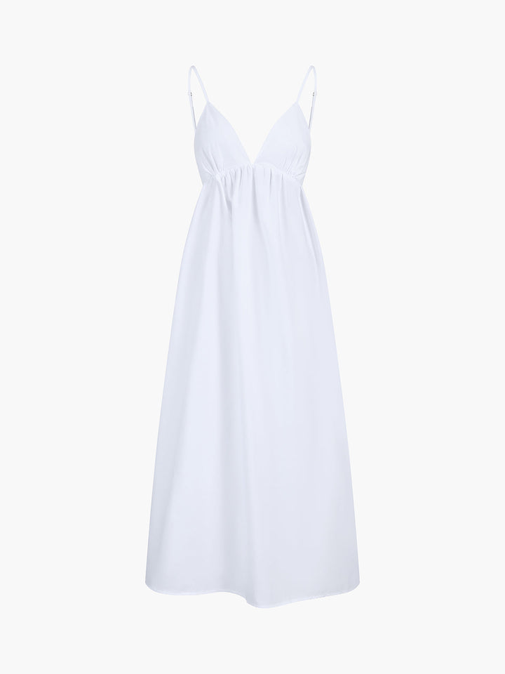 Women's summer A-line V-neck dress, backless with spaghetti straps, offering a chic and comfortable fit.