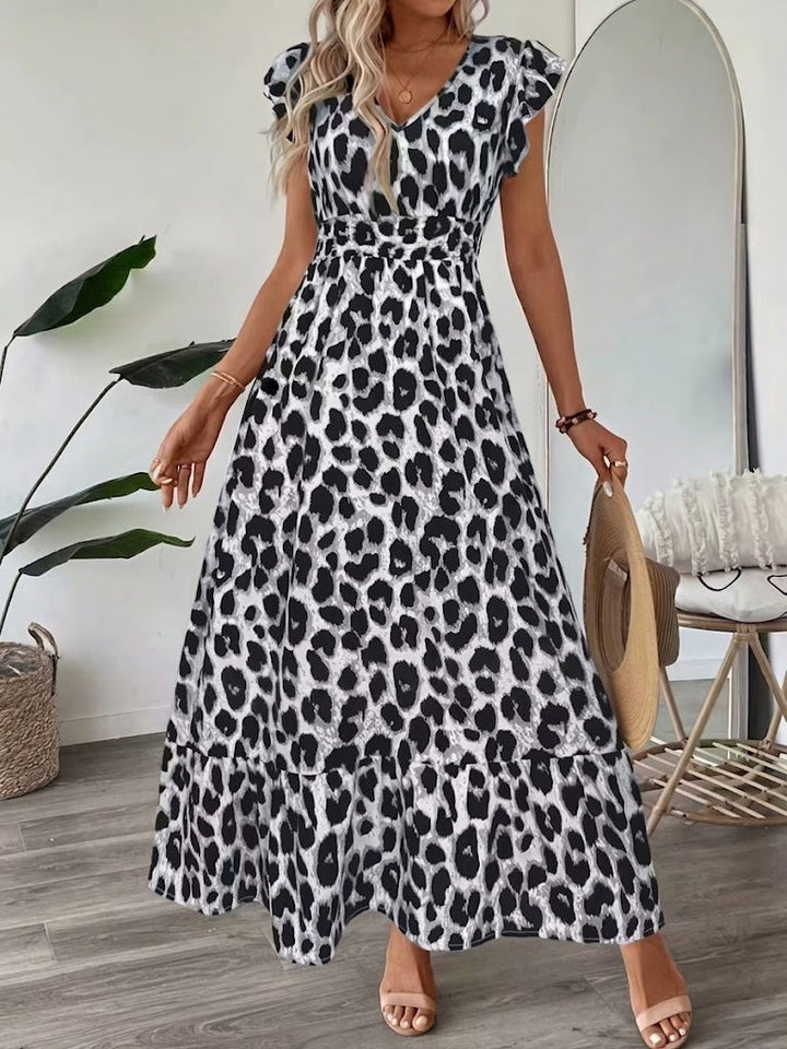Chic women's baroque print V-neck maxi dress, an elegant long flowing dress for any special occasion.