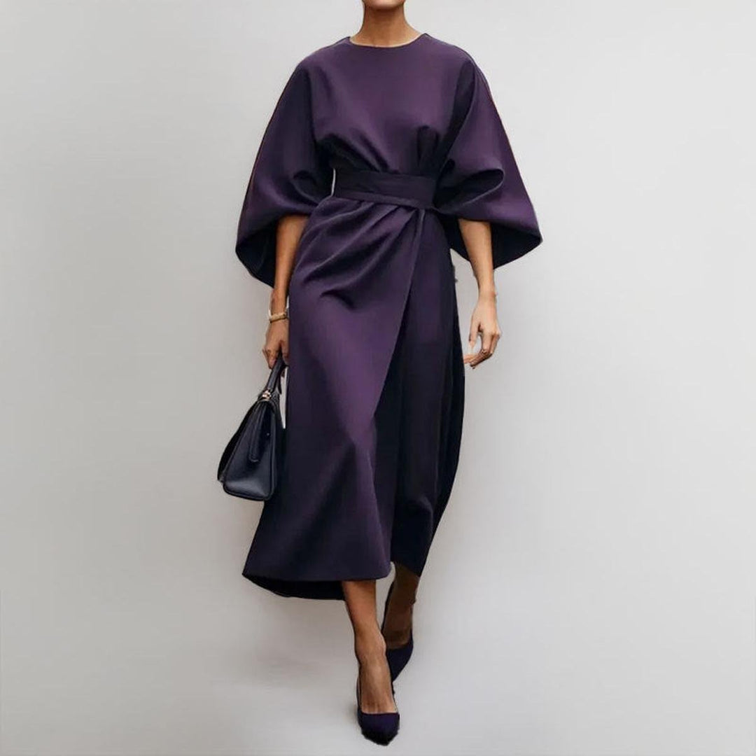 Chic women's elegant maxi dress with batwing sleeves. A modest, long, flowy dress suitable for formal events & parties.