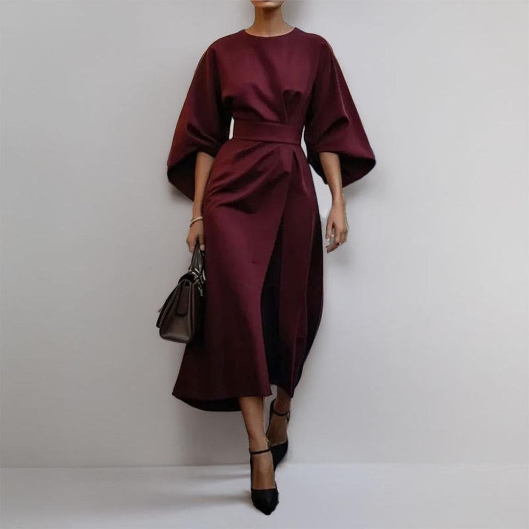 Sophisticated women's long maxi dress for evening wear. Elegant batwing sleeve design, perfect formal or party dress.