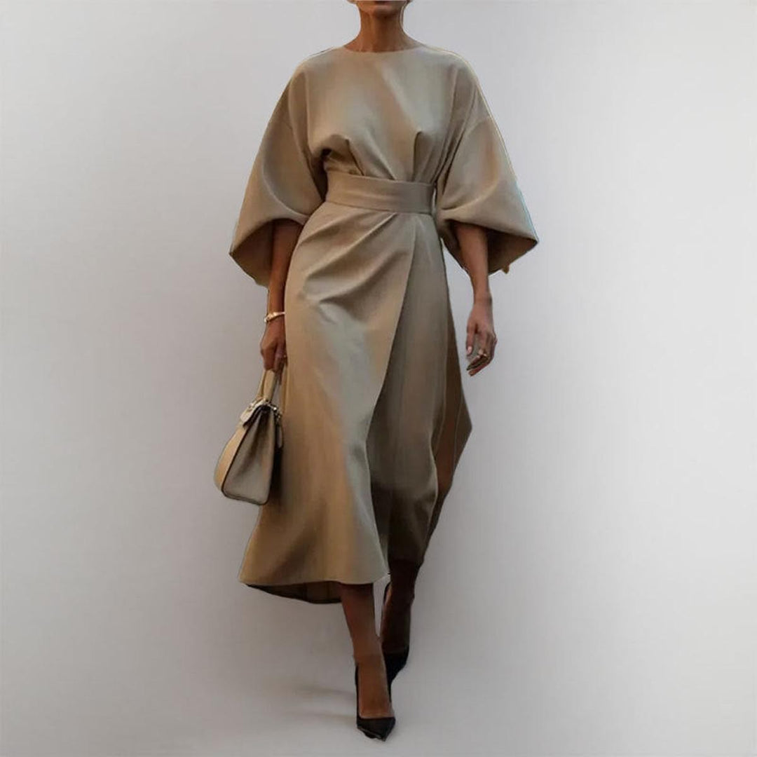 Comfortable yet elegant women's maxi dress with batwing sleeves. Long, flowy, and modest, ideal for formal parties.