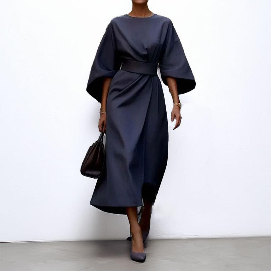 Front view: Elegant women's batwing sleeve maxi dress. A flowy, long formal dress for special occasions & evening wear.