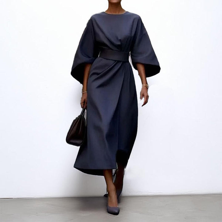 Front view: Elegant women's batwing sleeve maxi dress. A flowy, long formal dress for special occasions & evening wear.