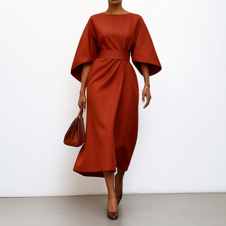 Stylish women's long maxi dress featuring elegant batwing sleeves. A flowy, modest, and formal dress for evening wear.