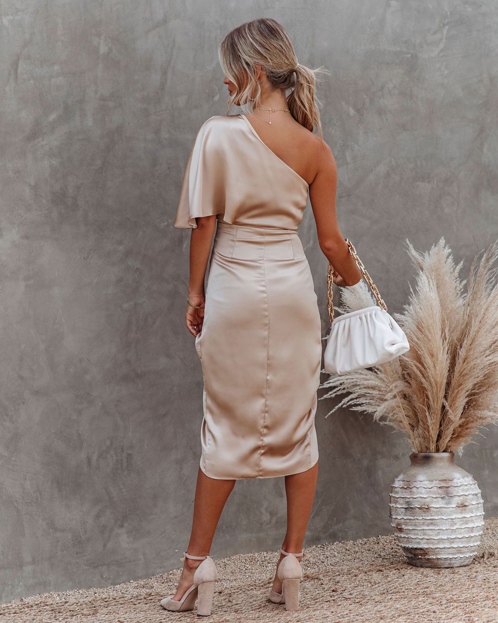 Sophisticated women's asymmetric one shoulder ruched beige midi dress for elegant evening wear and cocktail parties.