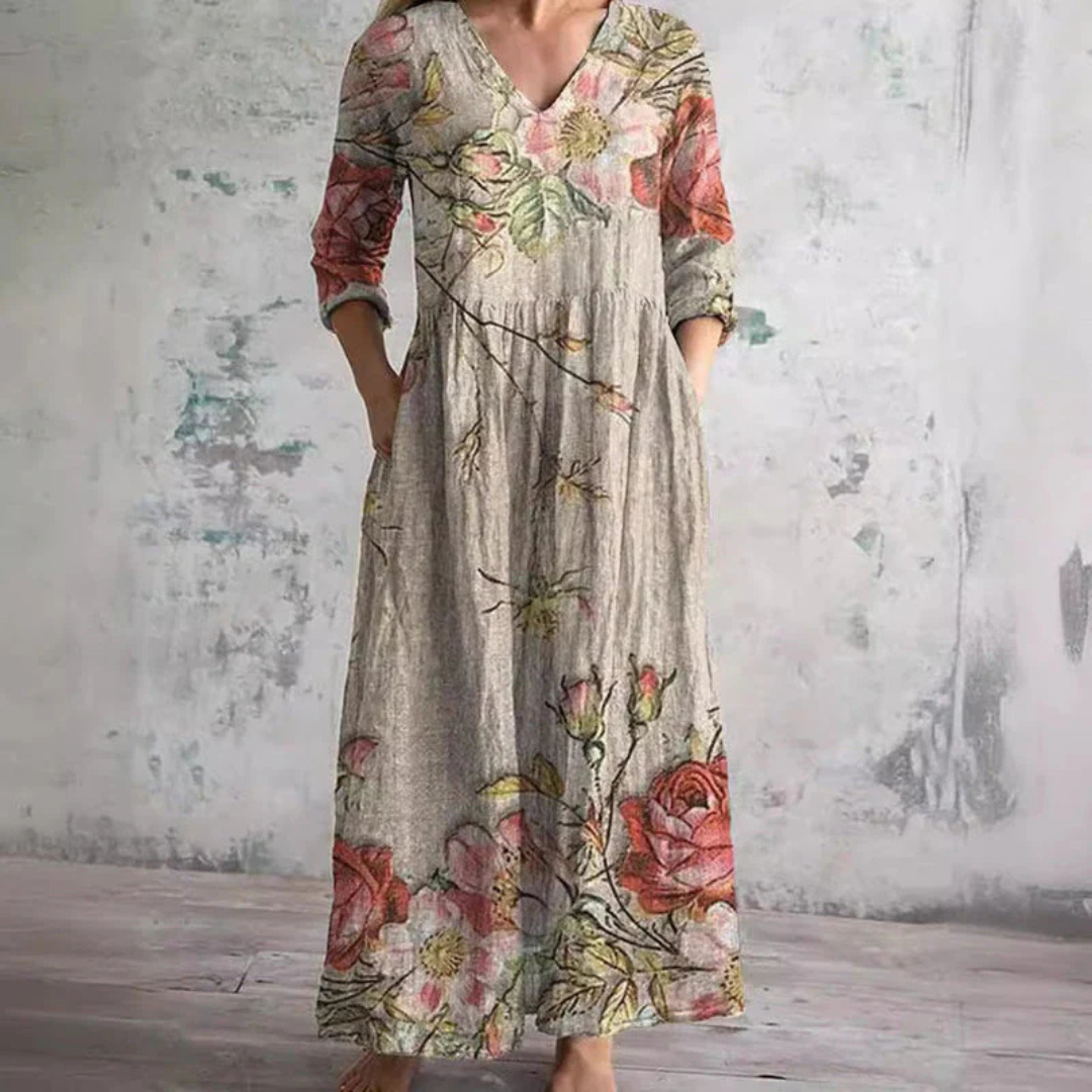 Elegant women's beige floral summer dress, flowing & comfortable, perfect for casual or vacation spring fashion.