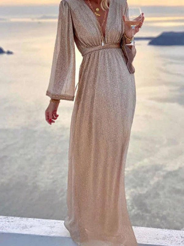 Elegant women's beige shimmer wrap maxi dress with V-neck and long sleeves, perfect for evening wear.