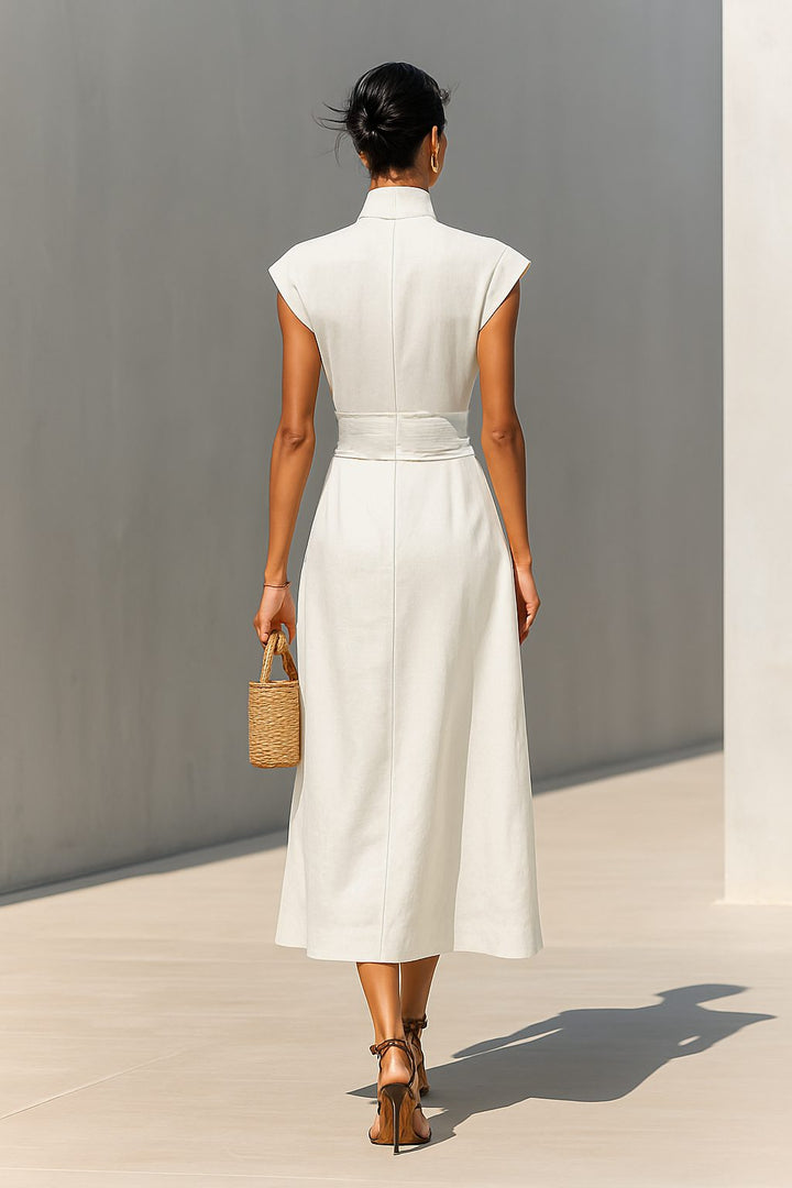 Chic beige sleeveless maxi dress for women, featuring a sophisticated lapel and flattering belted waist.