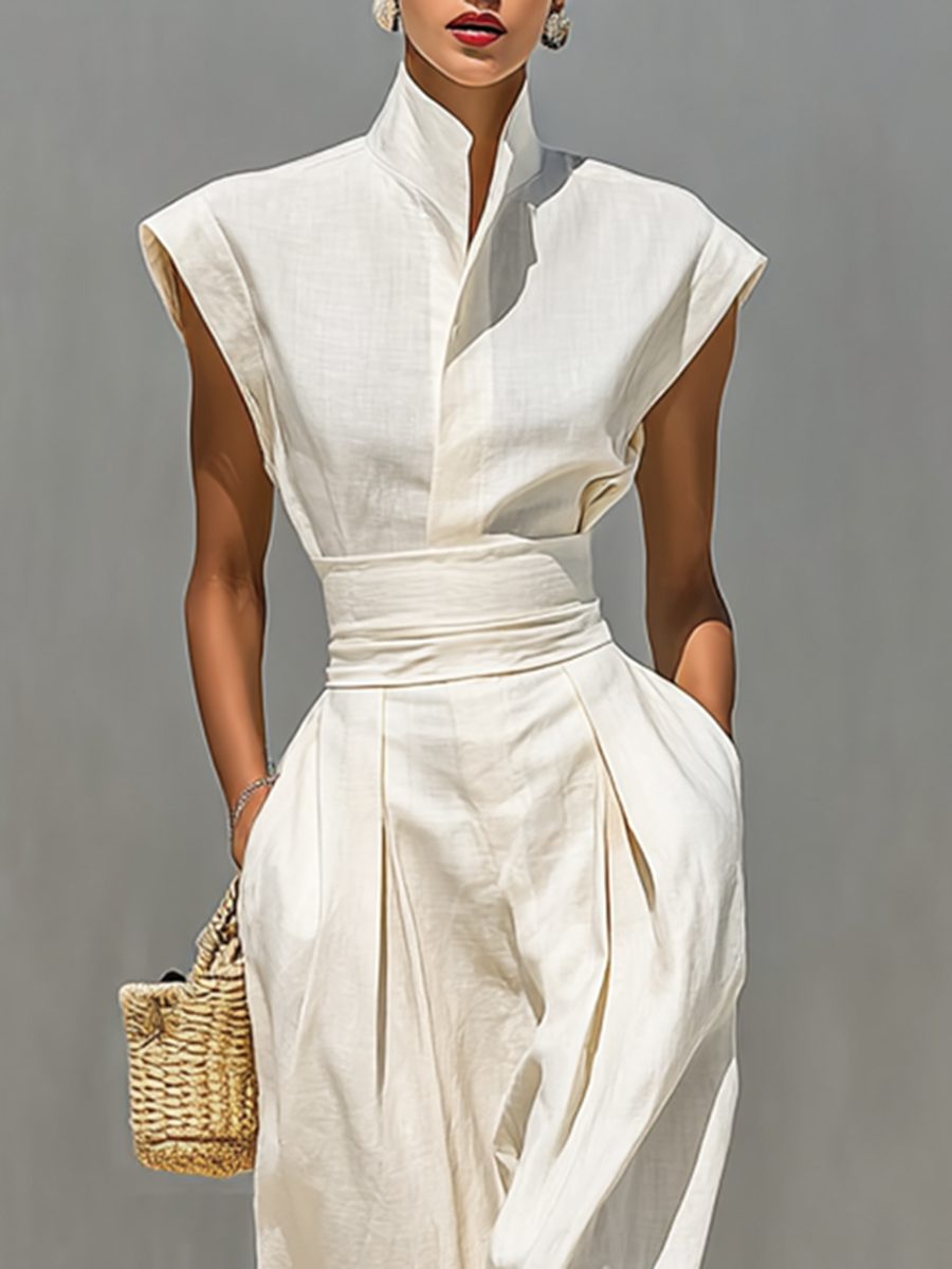 Sophisticated women's occasion dress: beige sleeveless maxi with elegant lapel collar and wrap-style belt.