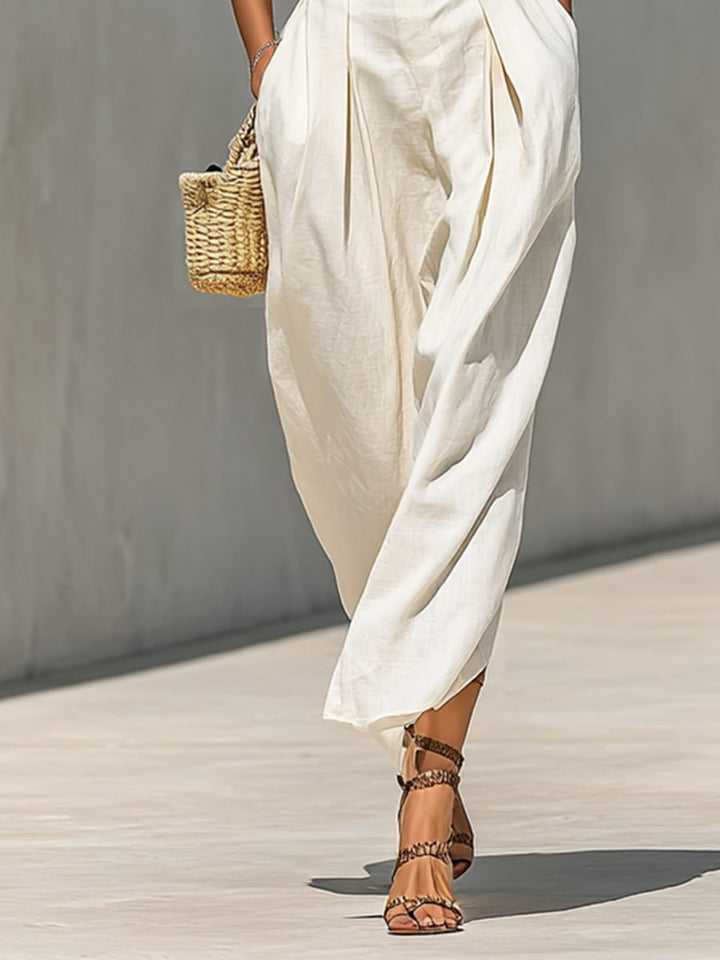 Formal women's beige belted maxi dress, sleeveless with a stylish lapel, ideal for party & evening wear.