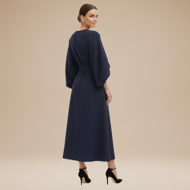 Stylish women's wrap dress with adjustable belt and midi hem