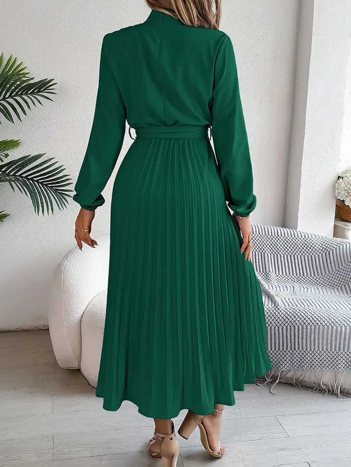 Professional women's work dress, elegant belted midi with long sleeves and pleated skirt.