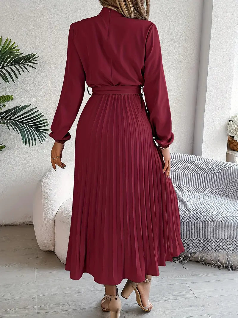 Women's fashion midi dress featuring long sleeves, a high neck, elegant pleats, and a flattering belted waist.