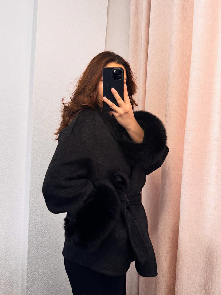 Fashion-forward women's wrap coat with a flattering belt & lavish faux fur cuffs for cold weather.