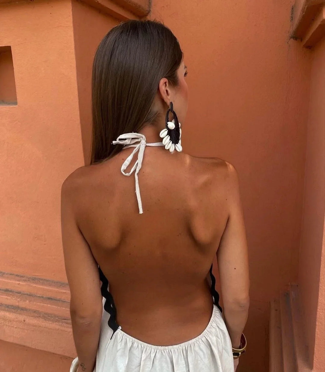 Stylish women's black & white sleeveless maxi wrap dress, perfect as a wedding guest or formal occasion dress.