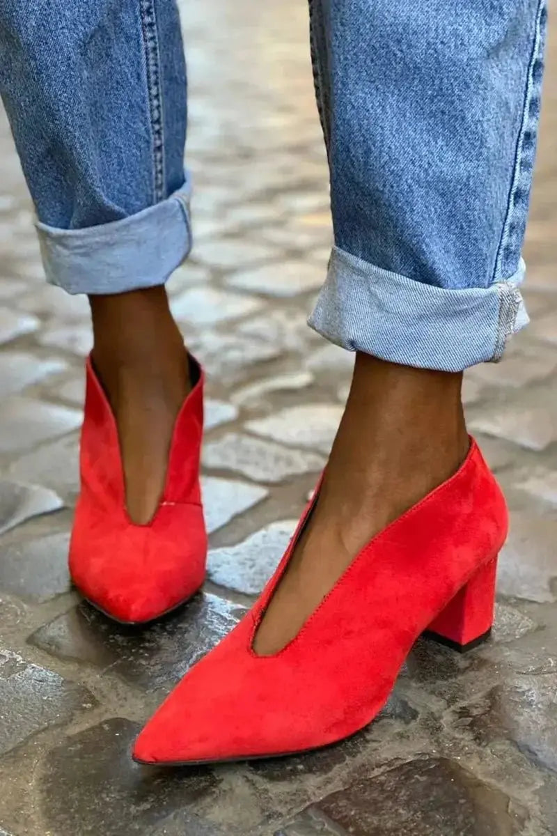 Stylish women's deep cut pointed toe block heel pumps, versatile court heels for fashion-forward office & evening wear.