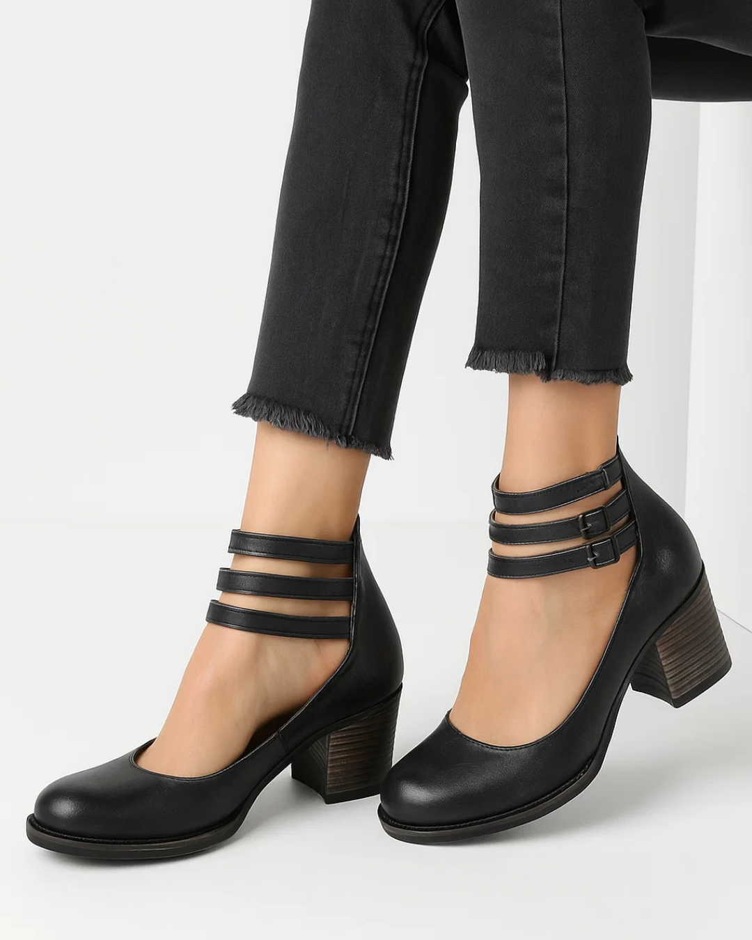 Comfortable women's round toe block heel pumps with ankle straps, ideal for office or elegant party wear.