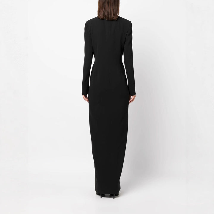 Tailored women's black maxi blazer dress. Double-breasted design, long sleeves. Sophisticated all-season event wear.