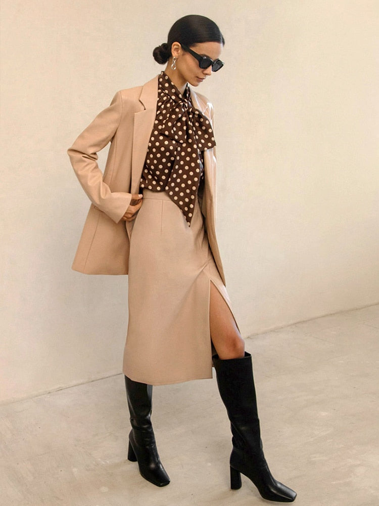 Versatile women's high waist bodycon midi skirt with elegant side slit for smart casual or evening fashion.