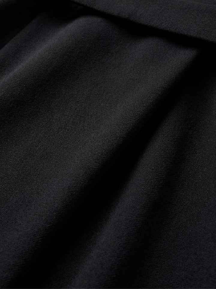 Chic & comfortable women's asymmetric midi dress with flowing cape sleeves. Perfect for a smart casual look.