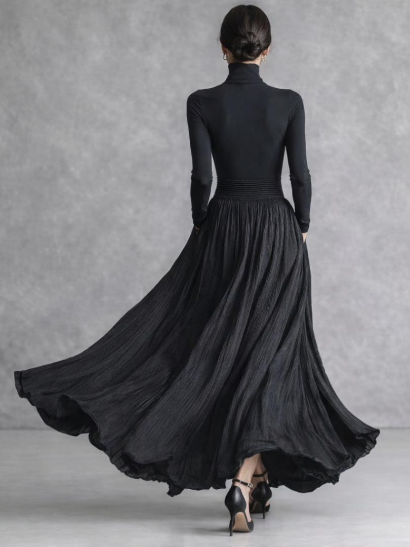 Beautiful women's black pleated turtleneck maxi dress, long sleeve, full skirt, elegant for evening wear.
