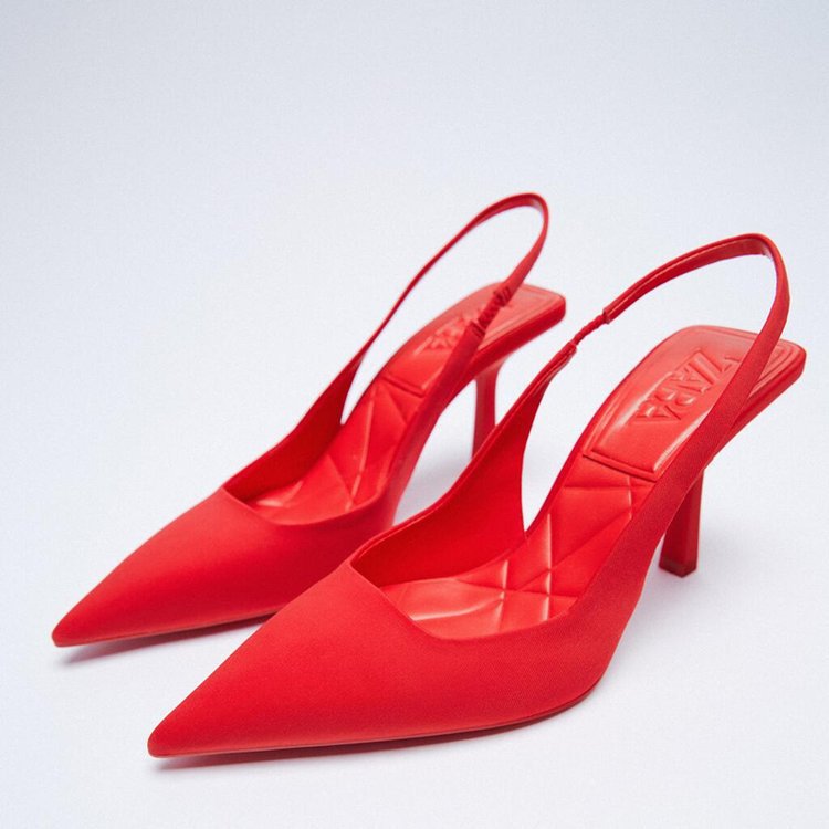 Classic yet modern women's dress shoes: black slingback pumps with a comfortable pointed toe and elegant footwear design.