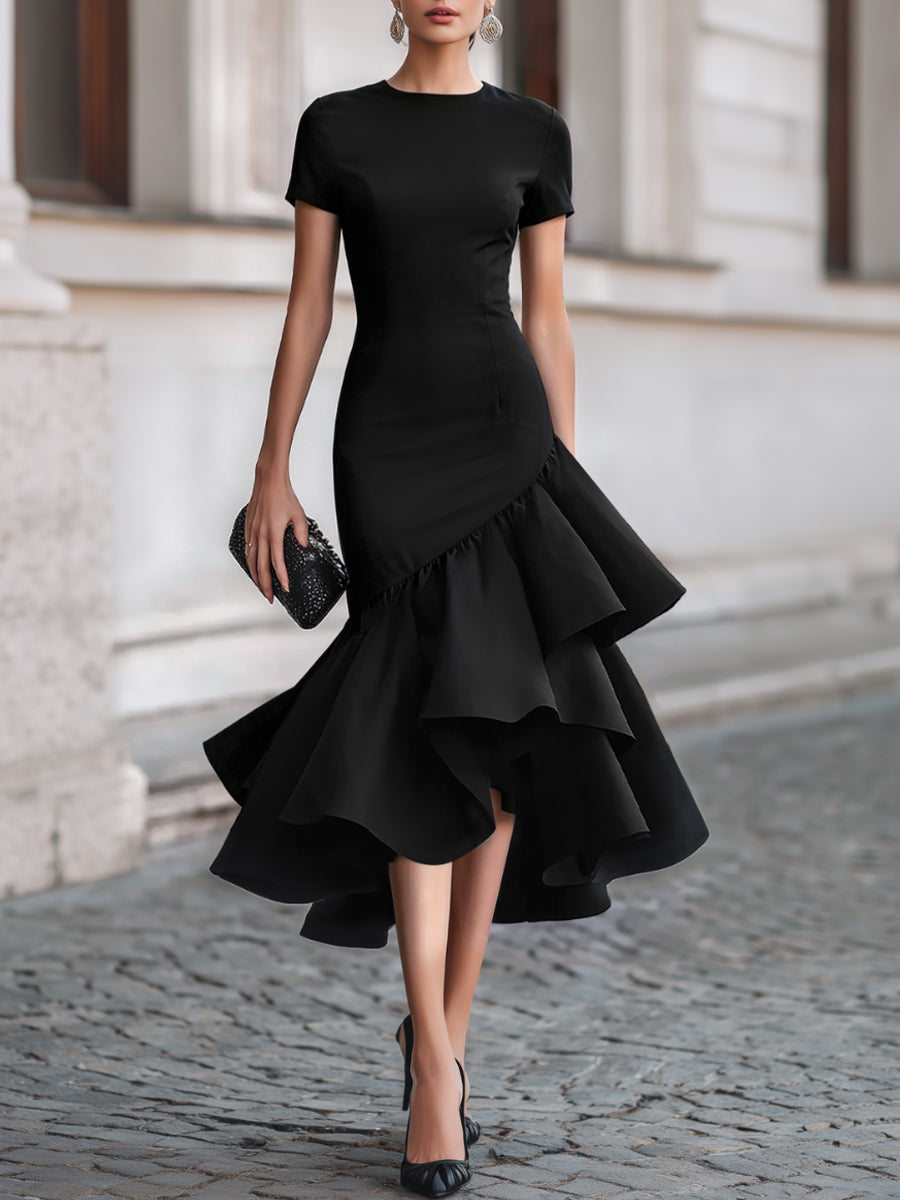 Sophisticated black tailored midi dress with asymmetric hem & ruffle detail; ideal for formal evening occasions.