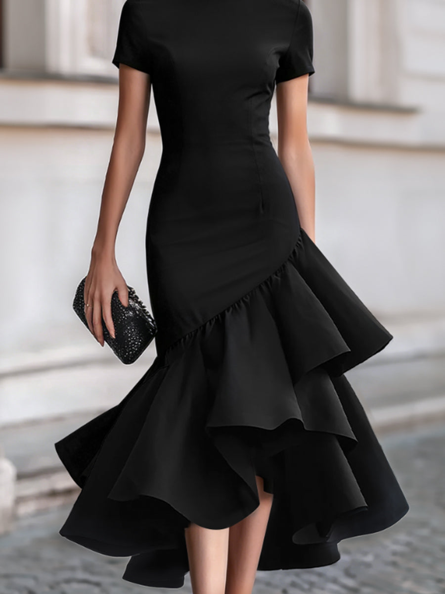Women's elegant black tailored midi dress featuring a distinctive ruffle and asymmetric hem, for special occasions.